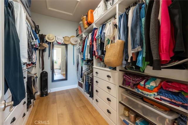 18182 Bissel Dr, Riverside, CA 92508 - spacious closet with attic access and light wood-style flooring