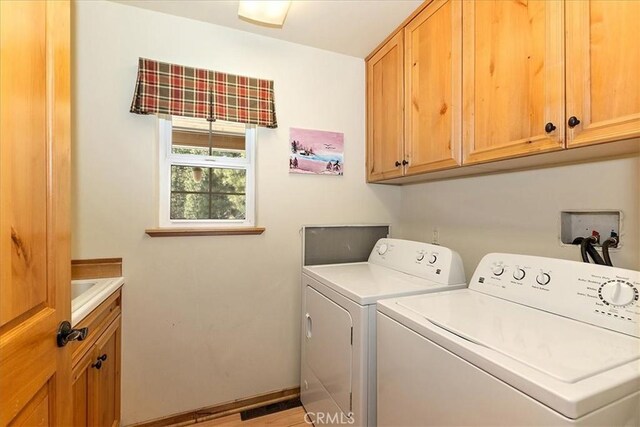 105 Olympic Dr, Big Bear Lake, CA 92315 - clothes washing area featuring independent washer and dryer, baseboards, and cabinet space
