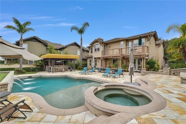 2 Aquila Way, Coto De Caza, CA 92679 - view of pool featuring a patio area, a pool with connected hot tub, and a residential view
