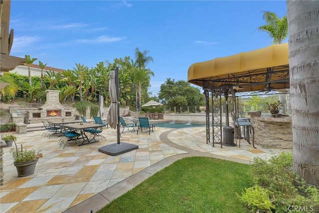 2 Aquila Way, Coto De Caza, CA 92679 - view of patio with an outdoor stone fireplace, an outdoor pool, and a gazebo