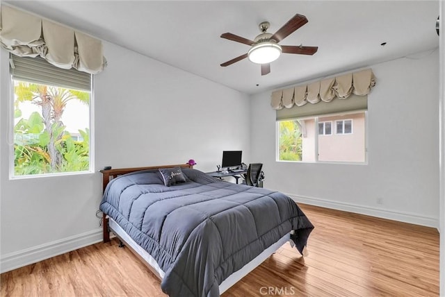 2 Aquila Way, Coto De Caza, CA 92679 - bedroom featuring wood finished floors, baseboards, and a ceiling fan