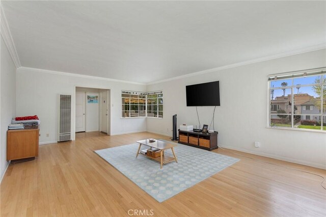 3515 E 1st St, Long Beach, CA 90803 - living area featuring baseboards, wood finished floors, and a healthy amount of sunlight