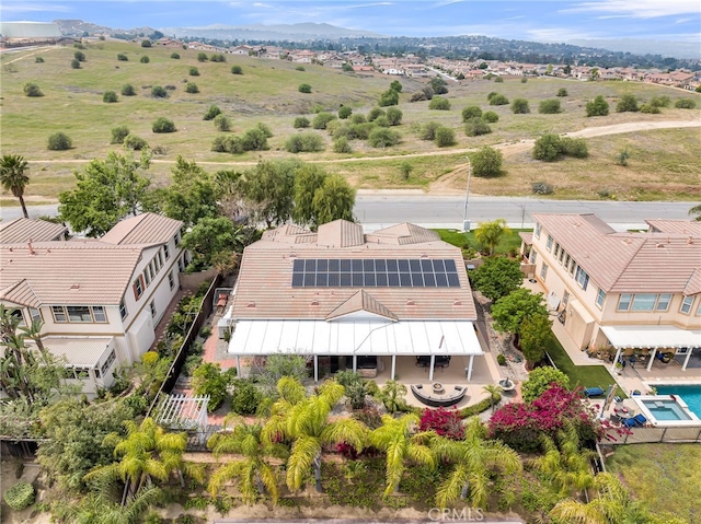 drone / aerial view featuring a mountain view