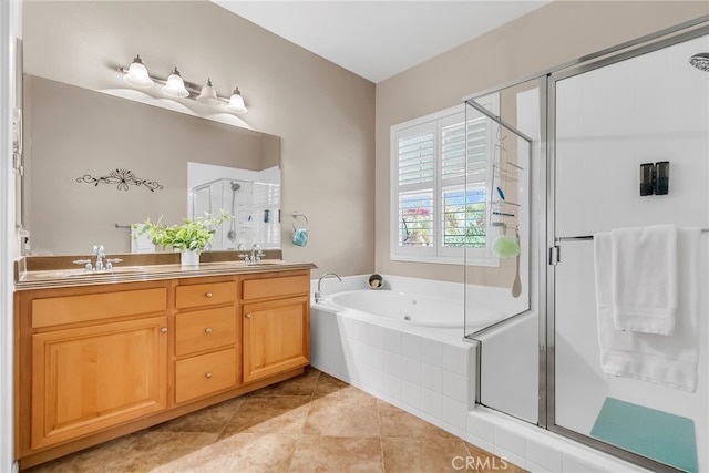 bathroom with a sink, a whirlpool tub, a shower stall, and double vanity