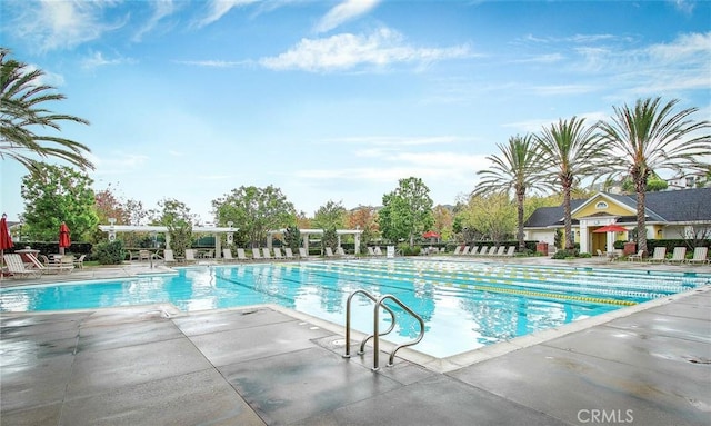 pool with a patio area
