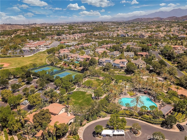 birds eye view of property featuring a mountain view and a residential view