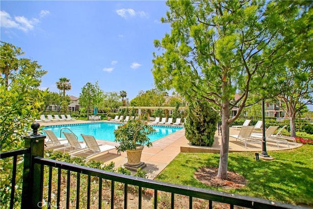 community pool with a patio