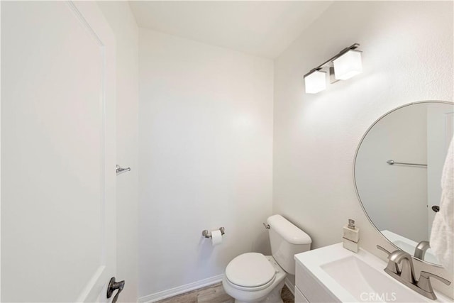 bathroom featuring a sink and toilet