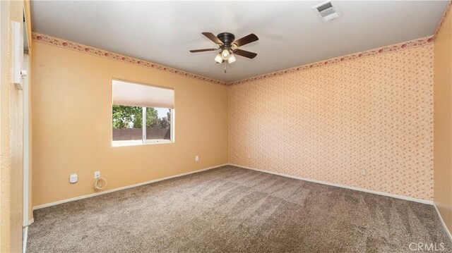 4176 Goss Rd, Phelan, CA 92371 - empty room with carpet floors, ceiling fan, and wallpapered walls