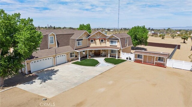 4176 Goss Rd, Phelan, CA 92371 - view of front of property with driveway, covered porch, a garage, and roof with shingles