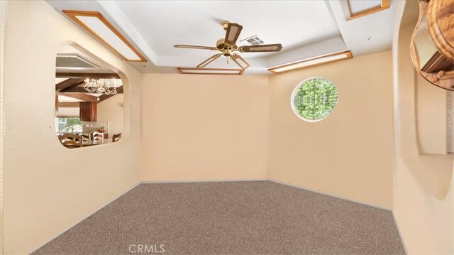 4176 Goss Rd, Phelan, CA 92371 - spare room featuring healthy amount of natural light, carpet floors, and a raised ceiling