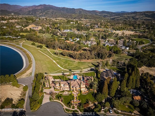 aerial view with a mountain view and a residential view