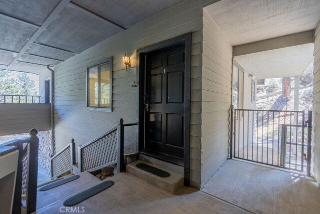 2405 Cedarwood Dr, Pine Mountain Club, CA 93222 - doorway to property with a porch