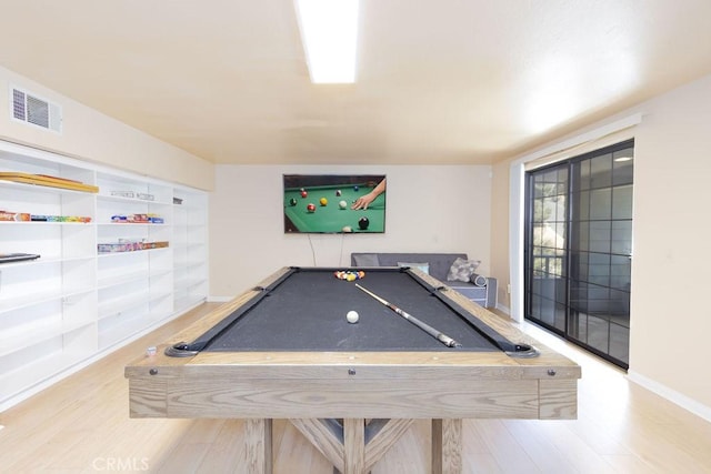 game room featuring billiards, wood finished floors, and visible vents