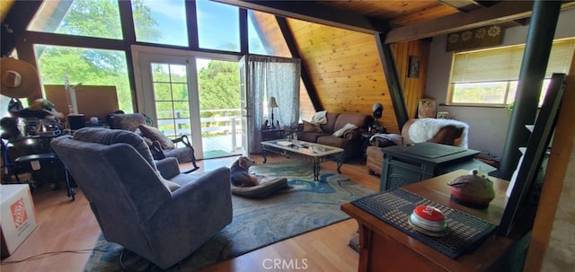 16937 Stagecoach Rd, Corning, CA 96021 - living room with wood walls, wood finished floors, vaulted ceiling with beams, and wood ceiling