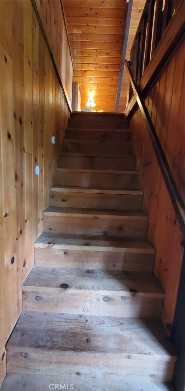 16937 Stagecoach Rd, Corning, CA 96021 - stairway featuring wood walls and wood ceiling