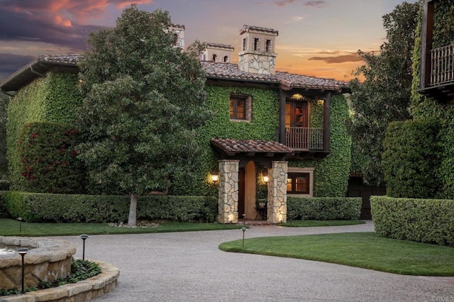 6314 El Apajo, Rancho Santa Fe, CA 92067 - mediterranean / spanish-style house with a tile roof, a chimney, and stone siding
