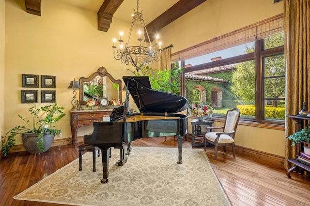 6314 El Apajo, Rancho Santa Fe, CA 92067 - sitting room with beamed ceiling, a chandelier, and wood-type flooring