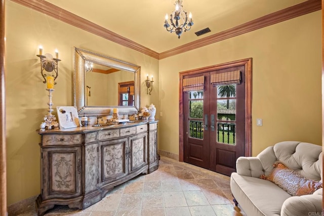 6314 El Apajo, Rancho Santa Fe, CA 92067 - entryway with french doors, crown molding, a chandelier, and stone tile flooring