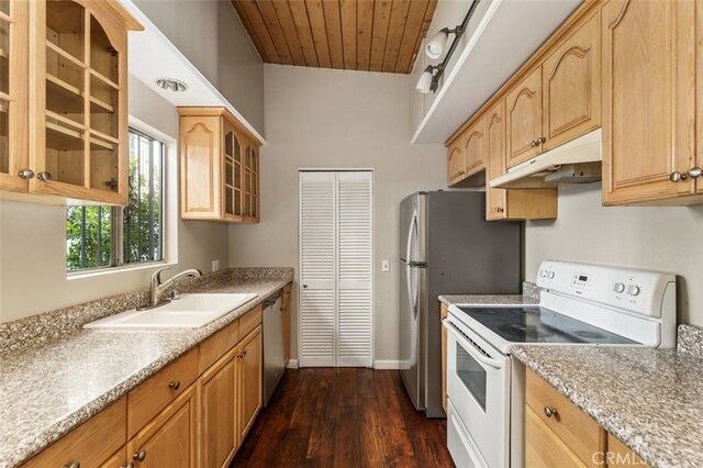 2516 Bayside Dr, Corona Del Mar, CA 92625 - kitchen with glass insert cabinets, dishwasher, a sink, under cabinet range hood, and white electric range oven