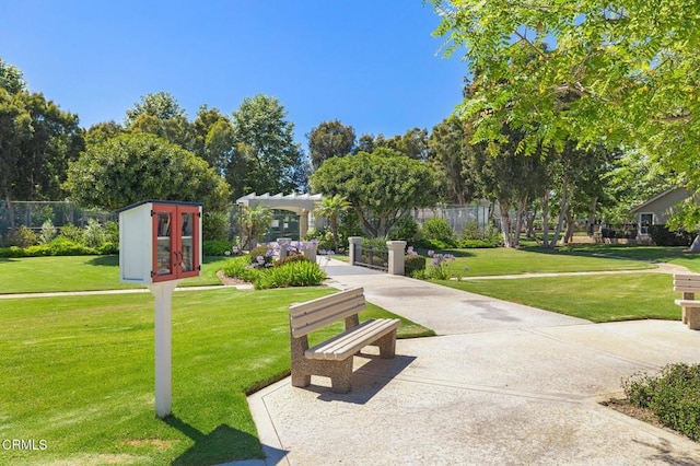 2101 Fox Den Ct, Oxnard, CA 93036 - view of community featuring a lawn and a pergola
