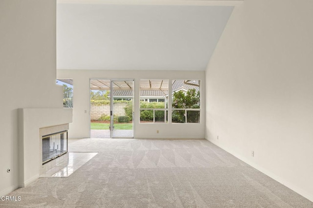 2101 Fox Den Ct, Oxnard, CA 93036 - unfurnished living room featuring high vaulted ceiling, a fireplace, and carpet