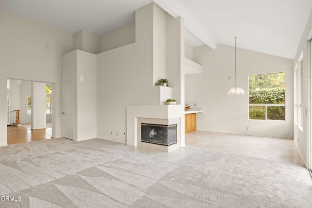 2101 Fox Den Ct, Oxnard, CA 93036 - unfurnished living room with high vaulted ceiling, light colored carpet, and beamed ceiling