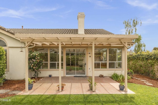 2101 Fox Den Ct, Oxnard, CA 93036 - back of property with stucco siding and a pergola
