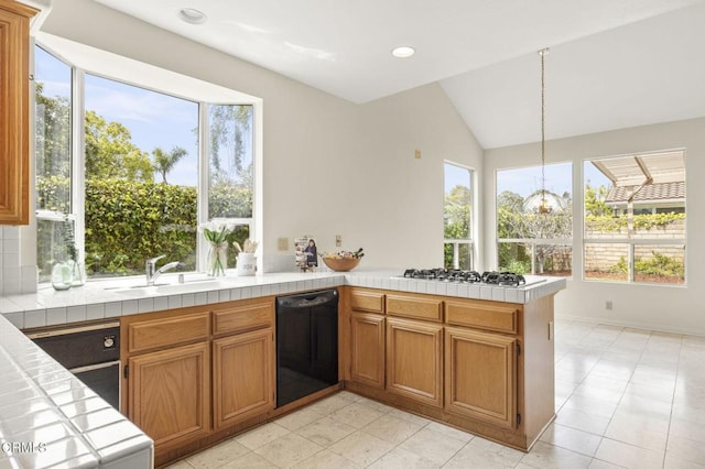 2101 Fox Den Ct, Oxnard, CA 93036 - kitchen with tile countertops, a peninsula, black dishwasher, a sink, and white gas stovetop