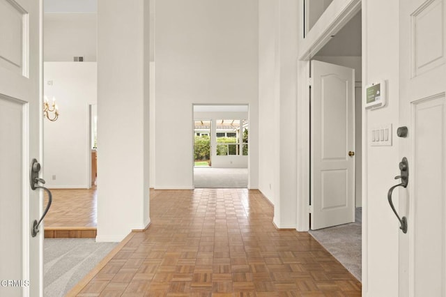 2101 Fox Den Ct, Oxnard, CA 93036 - hall featuring visible vents, a towering ceiling, and baseboards