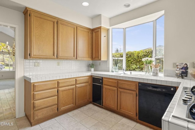 2101 Fox Den Ct, Oxnard, CA 93036 - kitchen with tasteful backsplash, dishwasher, and a healthy amount of sunlight