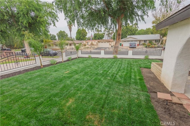 3456 Crownsworth St, Corona, CA 92879 - view of yard with fence private yard and a gate