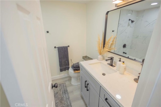 3456 Crownsworth St, Corona, CA 92879 - bathroom featuring baseboards, toilet, a shower, and vanity