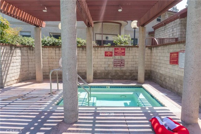 3610 Kalsman Dr Unit 2, Los Angeles, CA 90016 - view of pool featuring a pergola and fence