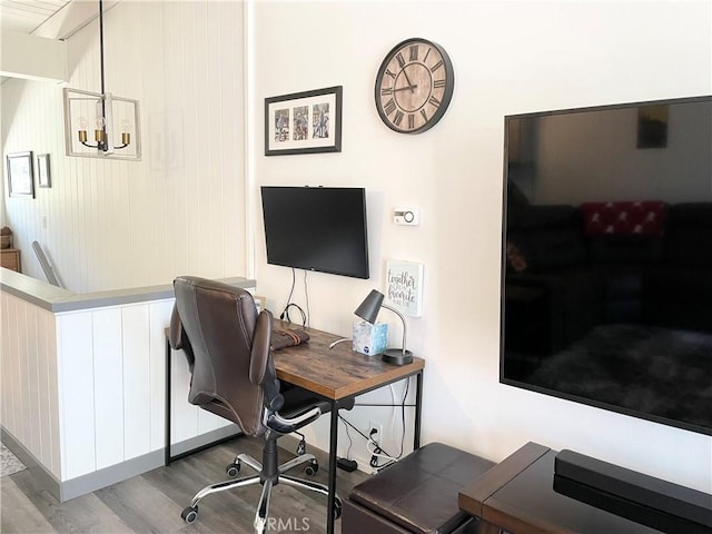 24 Tyrol Ln Unit 103, Mammoth Lakes, CA 95346 - office area with wood finished floors and a chandelier