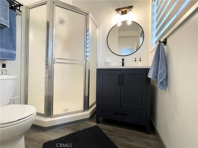 24 Tyrol Ln Unit 103, Mammoth Lakes, CA 95346 - bathroom with wood finished floors, a stall shower, and vanity