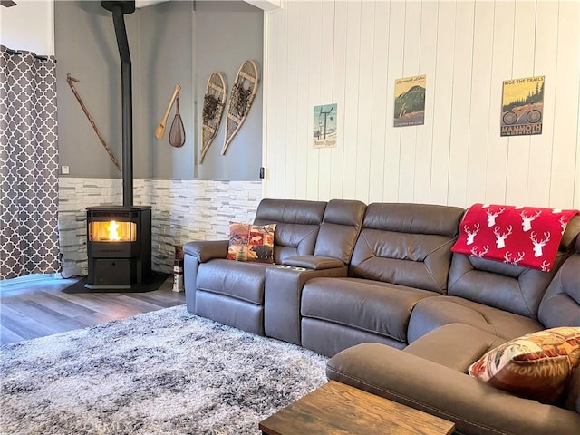 24 Tyrol Ln Unit 103, Mammoth Lakes, CA 95346 - living area with a wood stove and wood finished floors