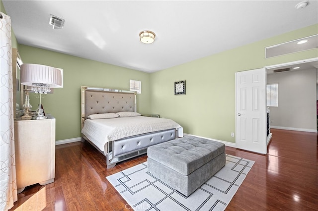 8481 Attica Dr, Riverside, CA 92508 - bedroom featuring baseboards, wood finished floors, visible vents, and multiple windows