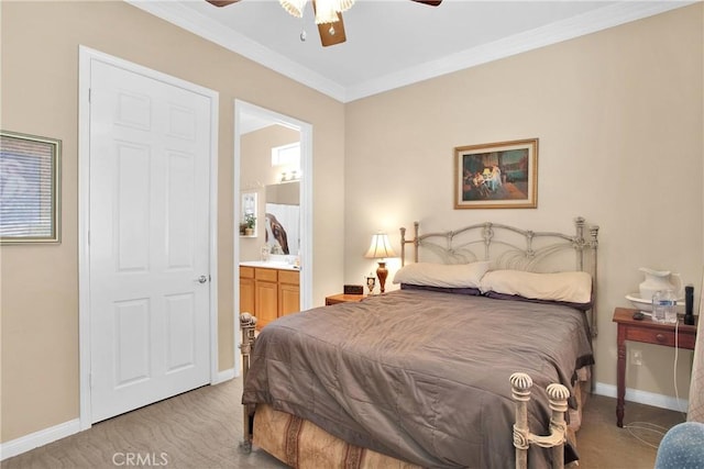 bedroom featuring light carpet, connected bathroom, crown molding, baseboards, and ceiling fan