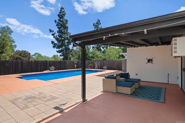 view of swimming pool with a fenced in pool, a patio area, and a fenced backyard