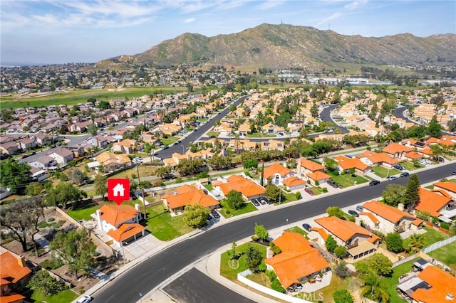 drone / aerial view featuring a mountain view and a residential view
