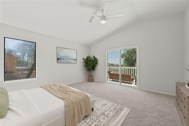 bedroom featuring baseboards, ceiling fan, vaulted ceiling, access to exterior, and carpet flooring