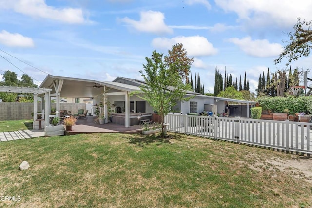19459 Lull St, Reseda, CA 91335 - back of house featuring a patio, a ceiling fan, a hot tub, and a pergola