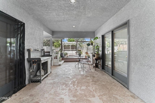 19459 Lull St, Reseda, CA 91335 - sunroom / solarium featuring a textured wall and a textured ceiling