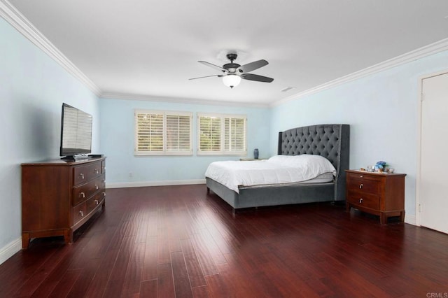 bedroom featuring baseboards, dark wood-style floors, ceiling fan, and crown molding