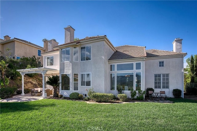 24932 Normans Way, Calabasas, CA 91302 - rear view of property with a chimney, a pergola, an outdoor living space, and a patio area