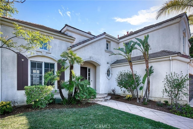 24932 Normans Way, Calabasas, CA 91302 - view of front of house with a front lawn and stucco siding