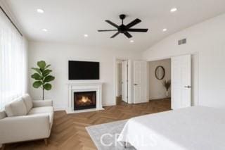 24932 Normans Way, Calabasas, CA 91302 - bedroom with a lit fireplace, recessed lighting, vaulted ceiling, and ceiling fan