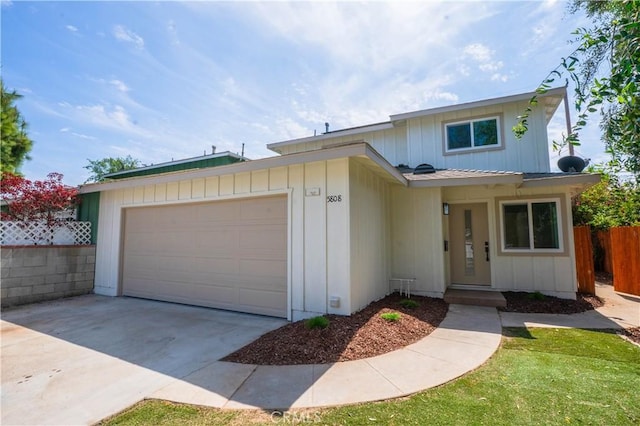 5808 Adele Ave, Whittier, CA 90606 - view of front facade featuring board and batten siding, fence, and driveway