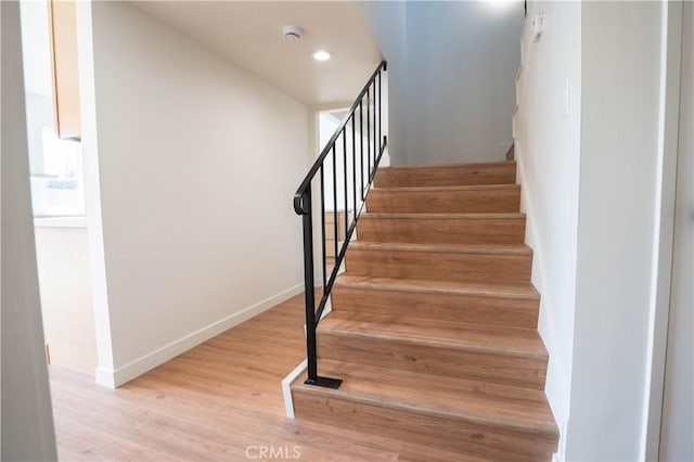 5808 Adele Ave, Whittier, CA 90606 - stairs with wood finished floors, baseboards, and recessed lighting
